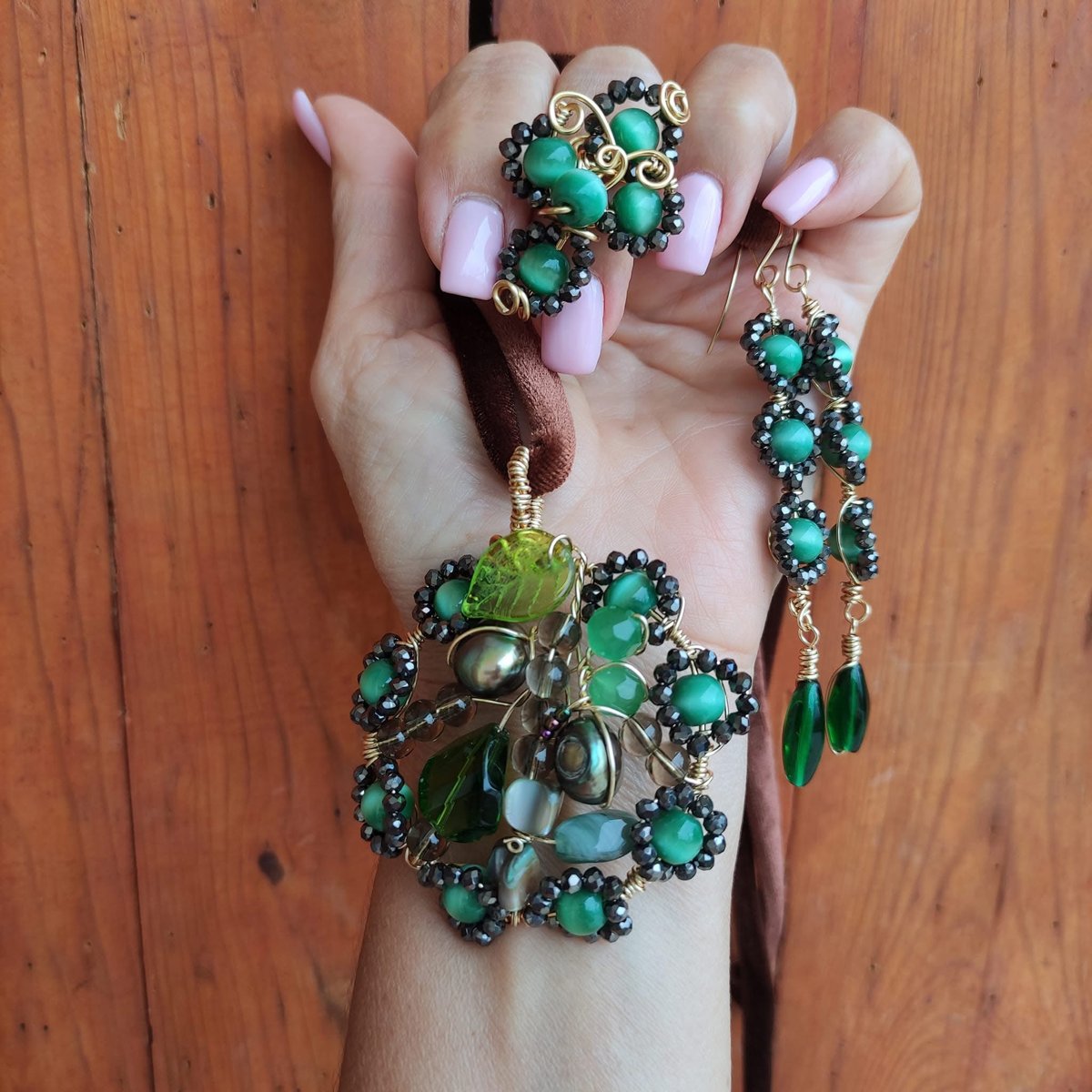Parure rosone collana, orecchini e anello