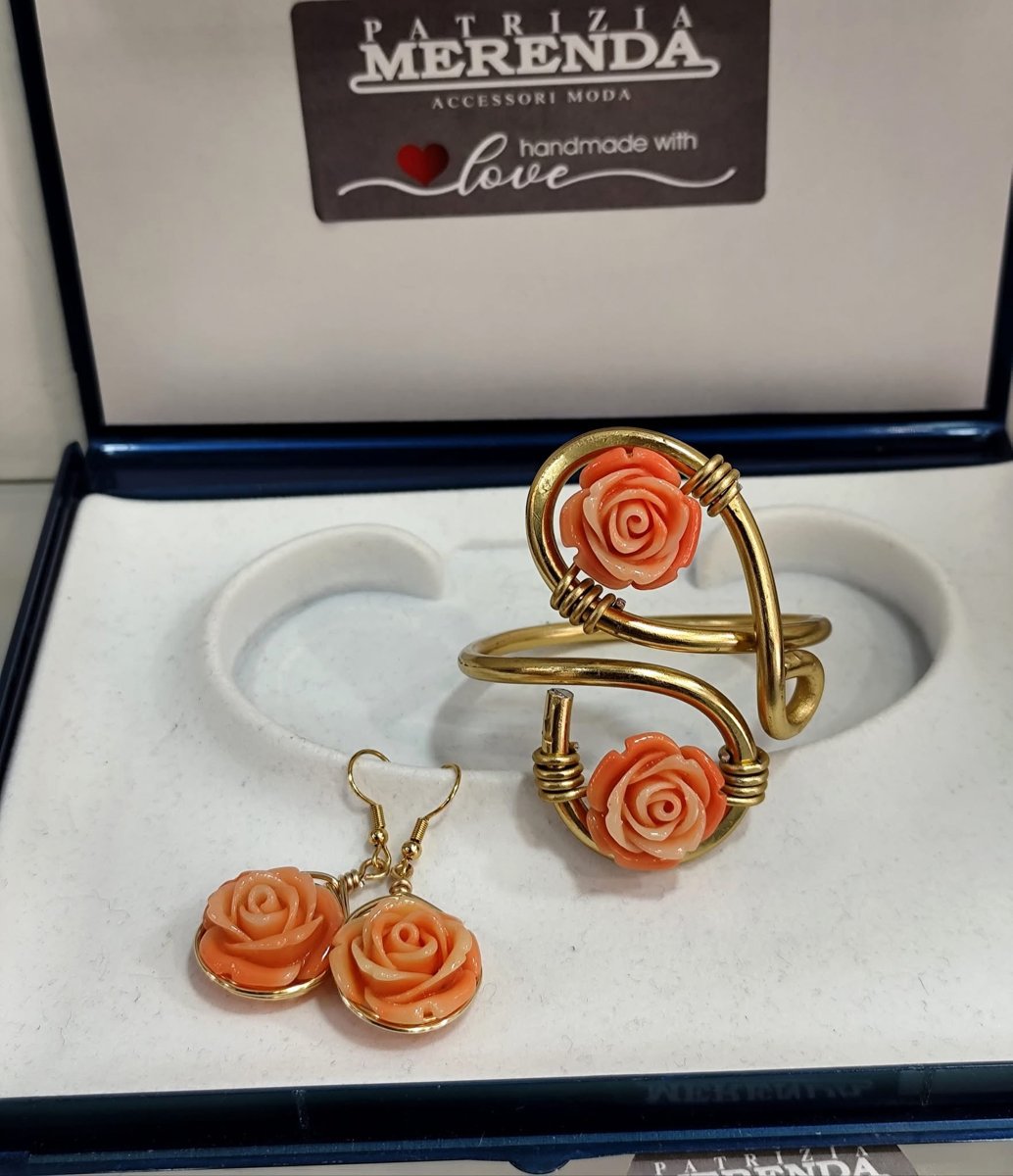 Bracciale e anello con rosa in resina