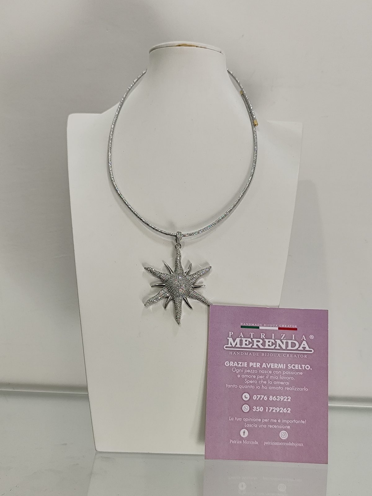 Collana con ciondolo a sole
