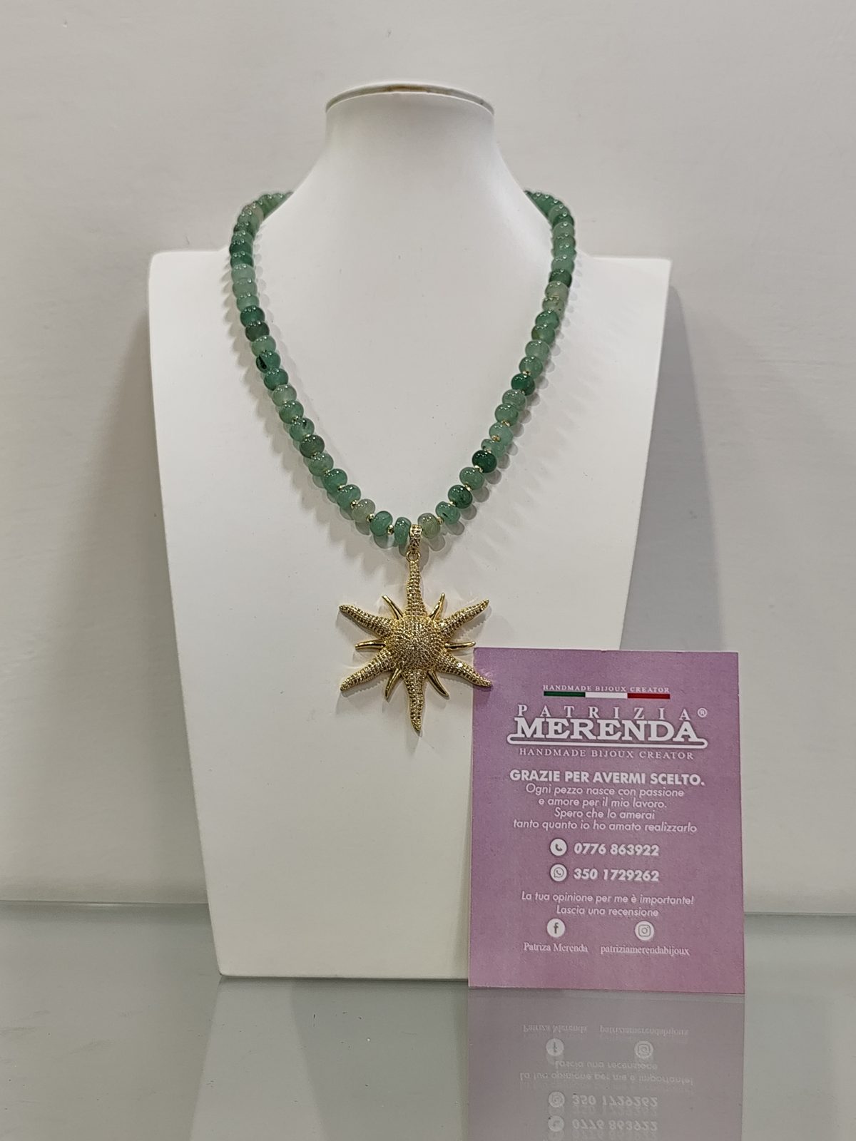 Collana con centrale a sole