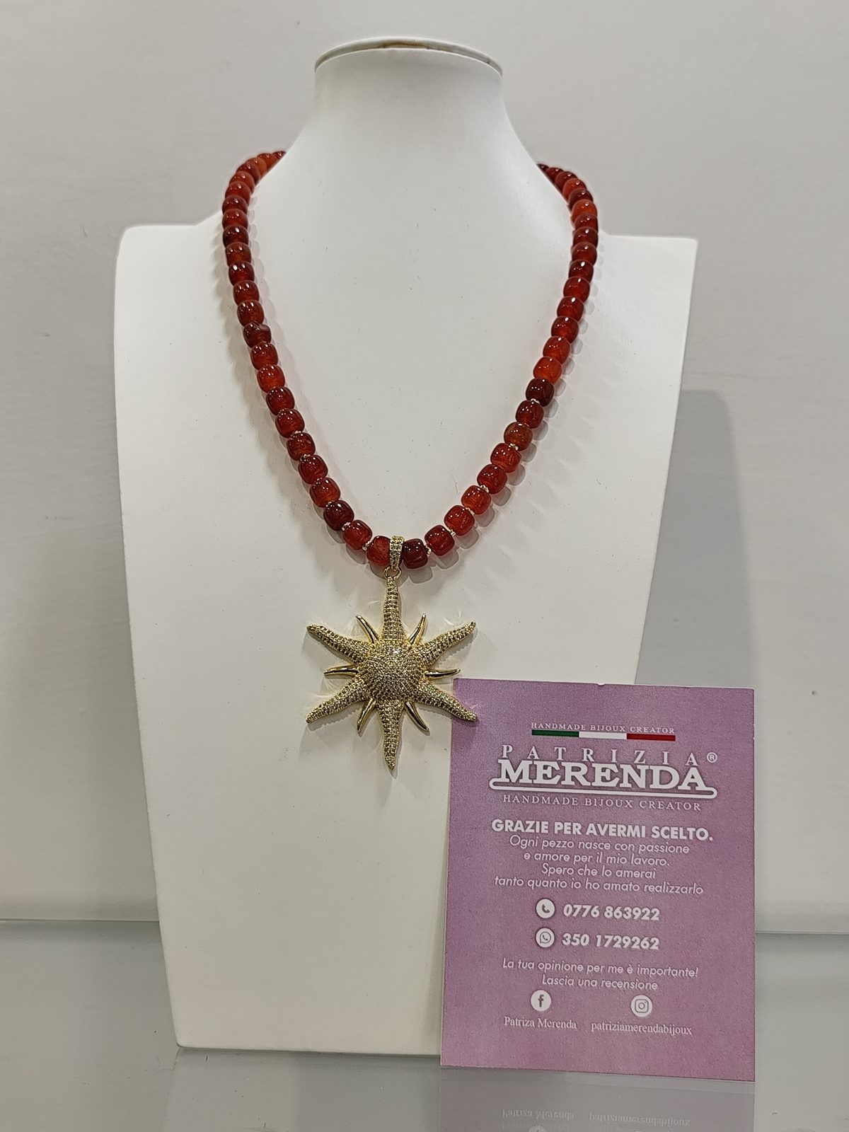 Collana con centrale a sole